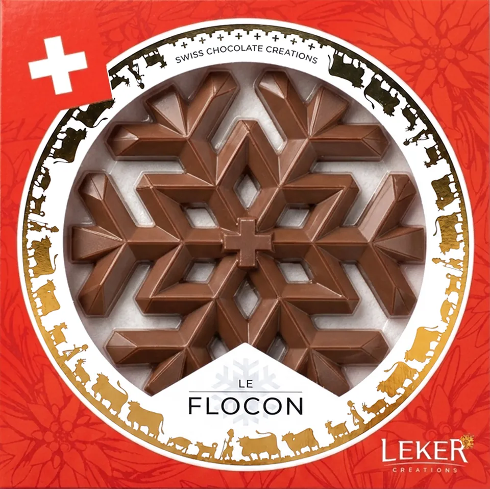 L’écrin rouge du Flocon, la pièce en chocolat au lait dans la fenêtre ronde